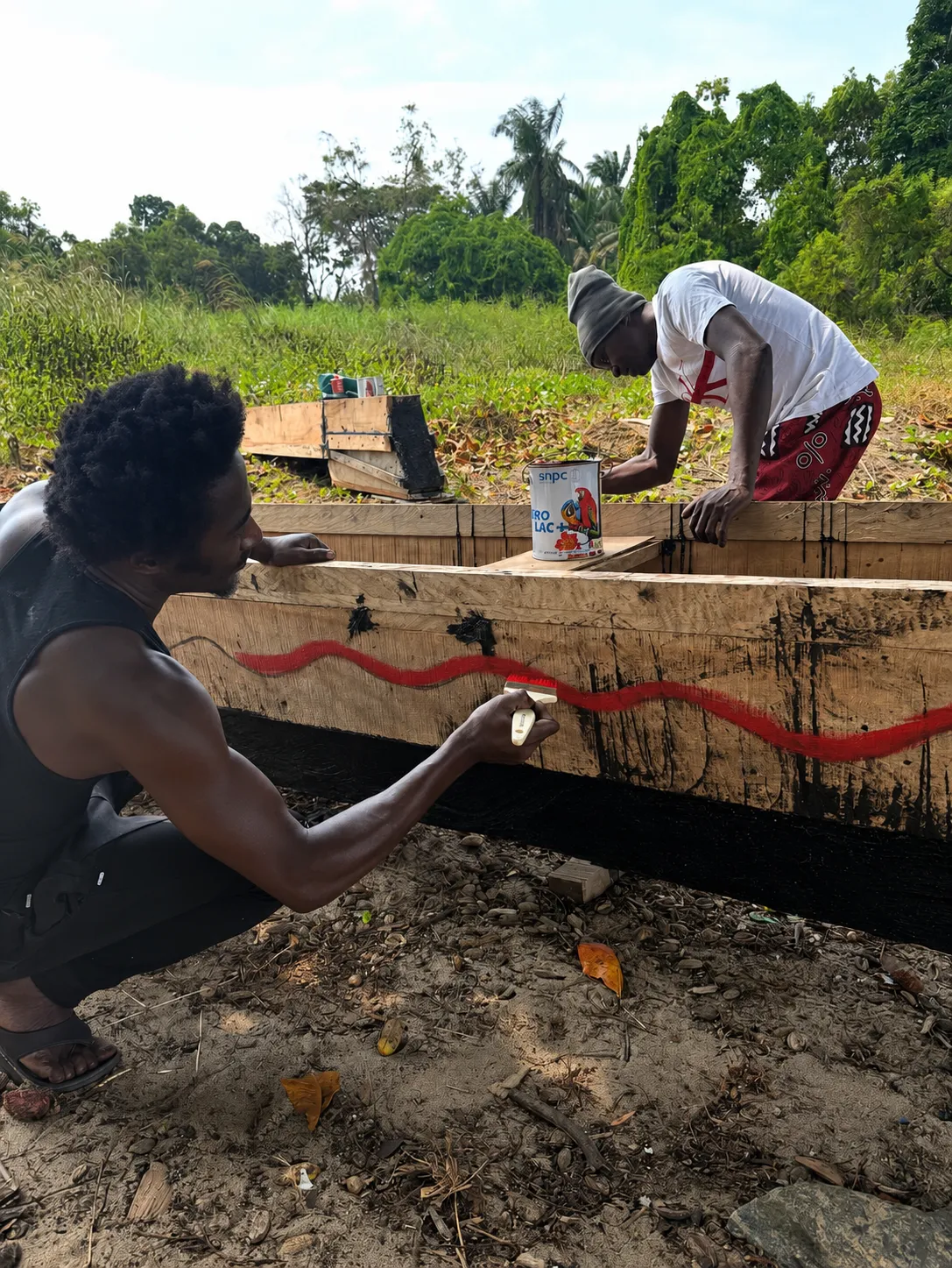 Building Mbilou's Bwiti pirogue on the beach, by the ocean — step 5